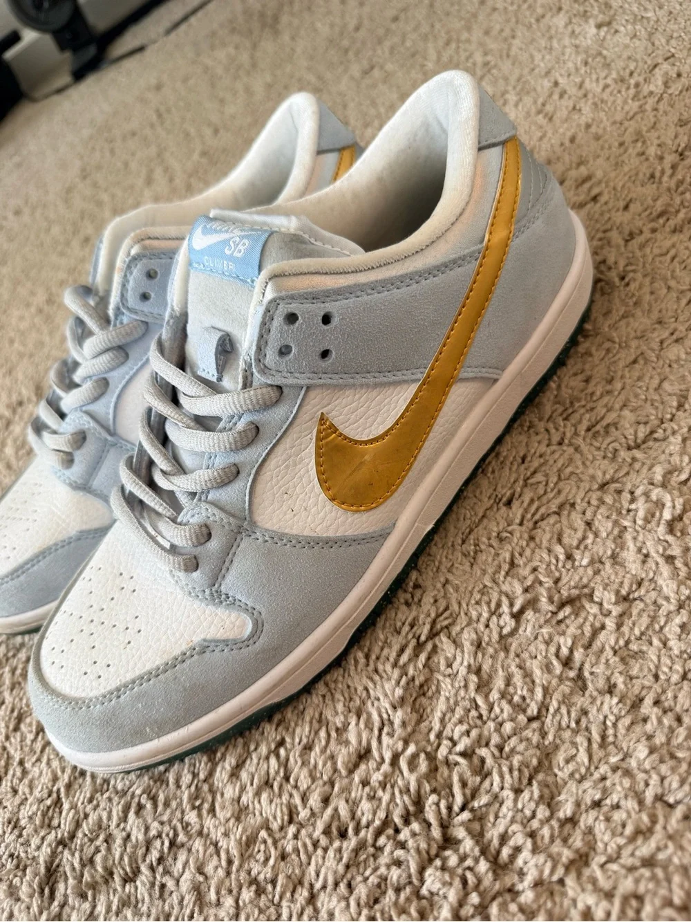 Nike Dunks x Sean Cliver Light Blue, White & Gold Low-Top Sneakers